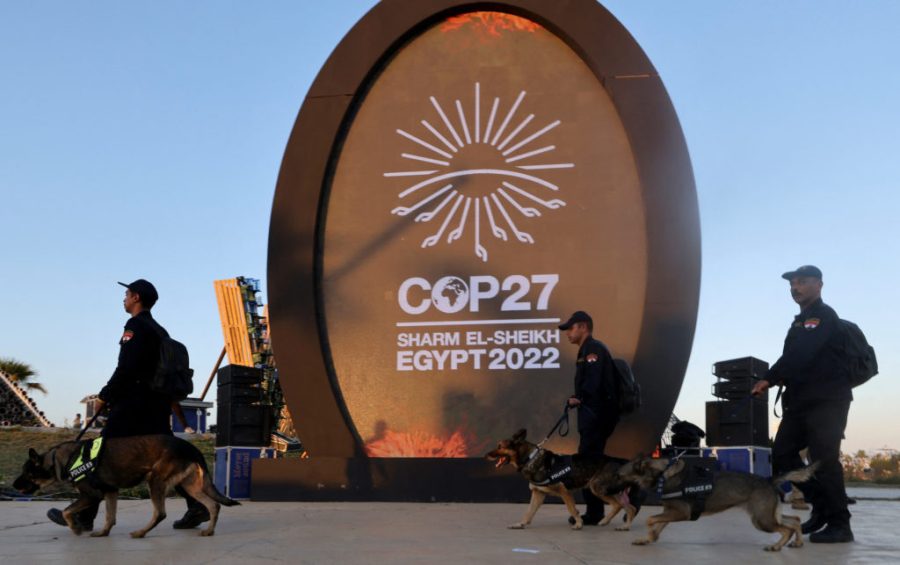 Egyptian security walks on patrol with a K9 unit during the COP27 climate summit in Sharm el-Sheikh, Egypt November 9, 2022. REUTERS/Mohamed Abd El Ghany