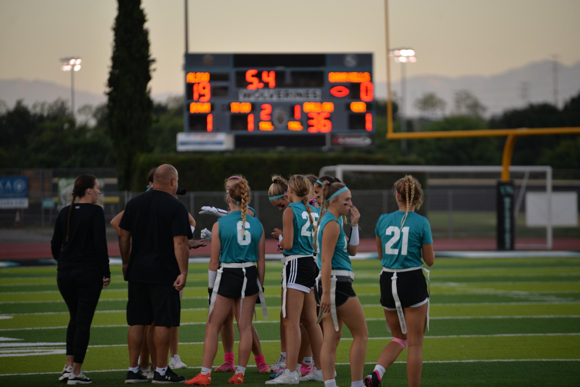 Flag Football talks during game