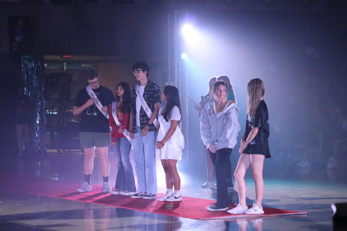 This years underclassman Homecoming Court winners walk out at the Welcome Back Pep Rally.