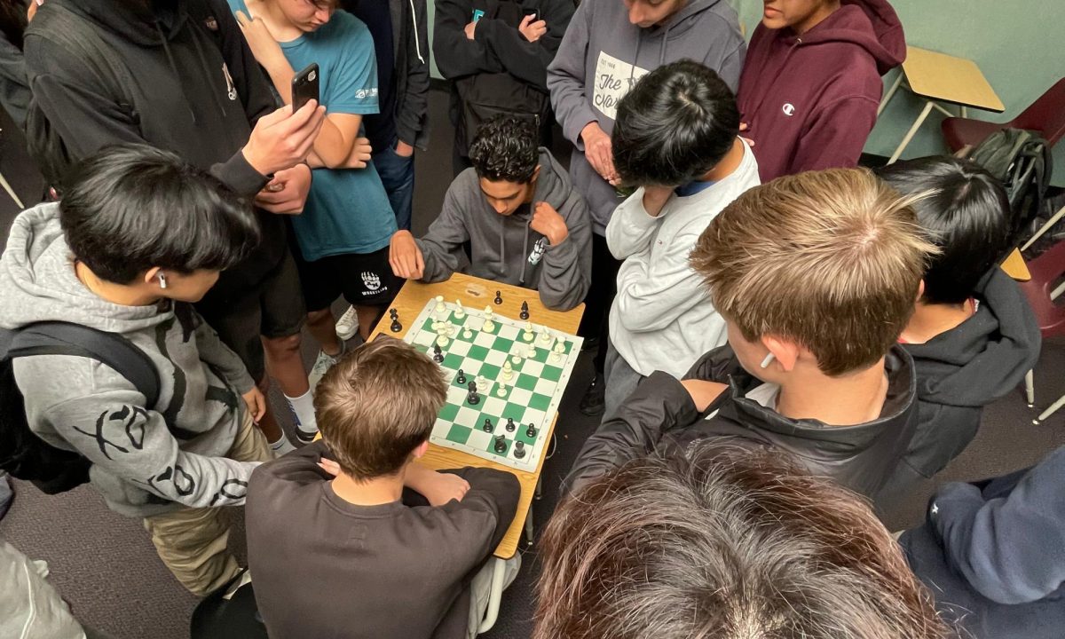 Students playing chess. 