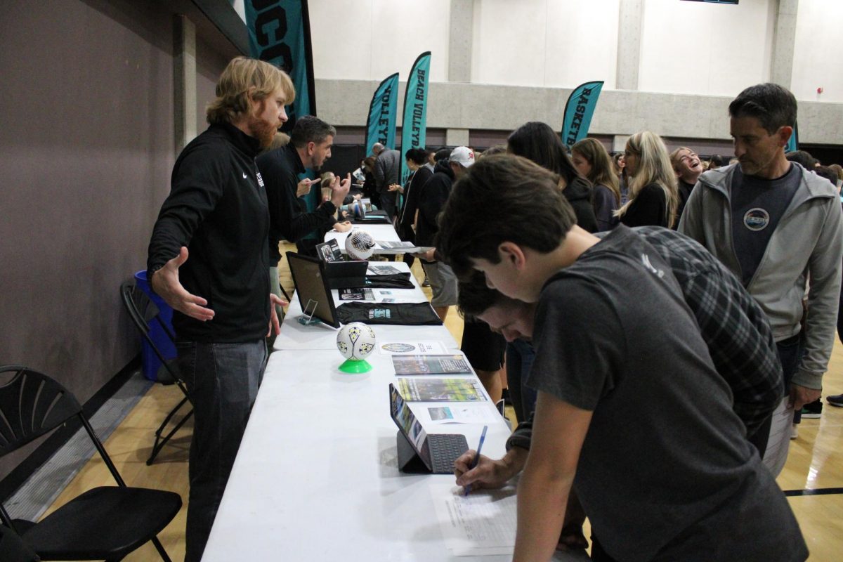 Eighth graders explore different booths at the Expo.