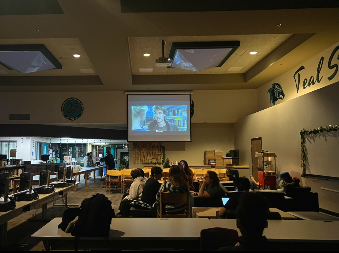Students attending Link Crew movie night in ANHS library. 