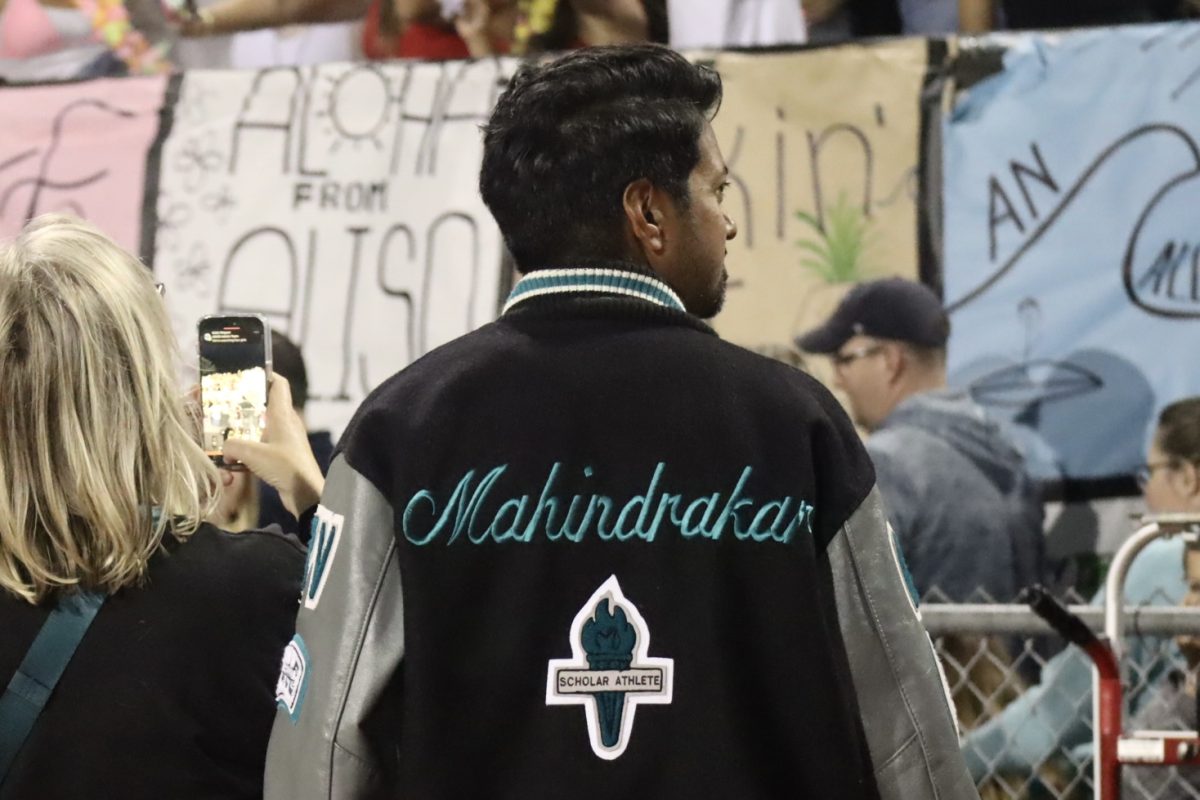 Dr.Mahindrakar looks into the Aliso Niguel crowd. 