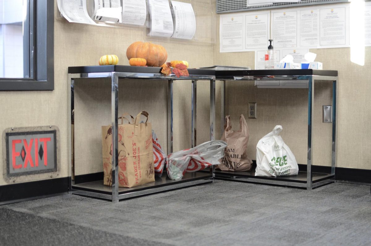 Students donate canned food to the drive.