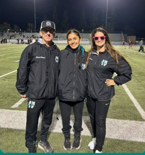 Camilla Abarca posing after running a 5:14.89 in the 1600m. From the instagram @alisotrackandfield