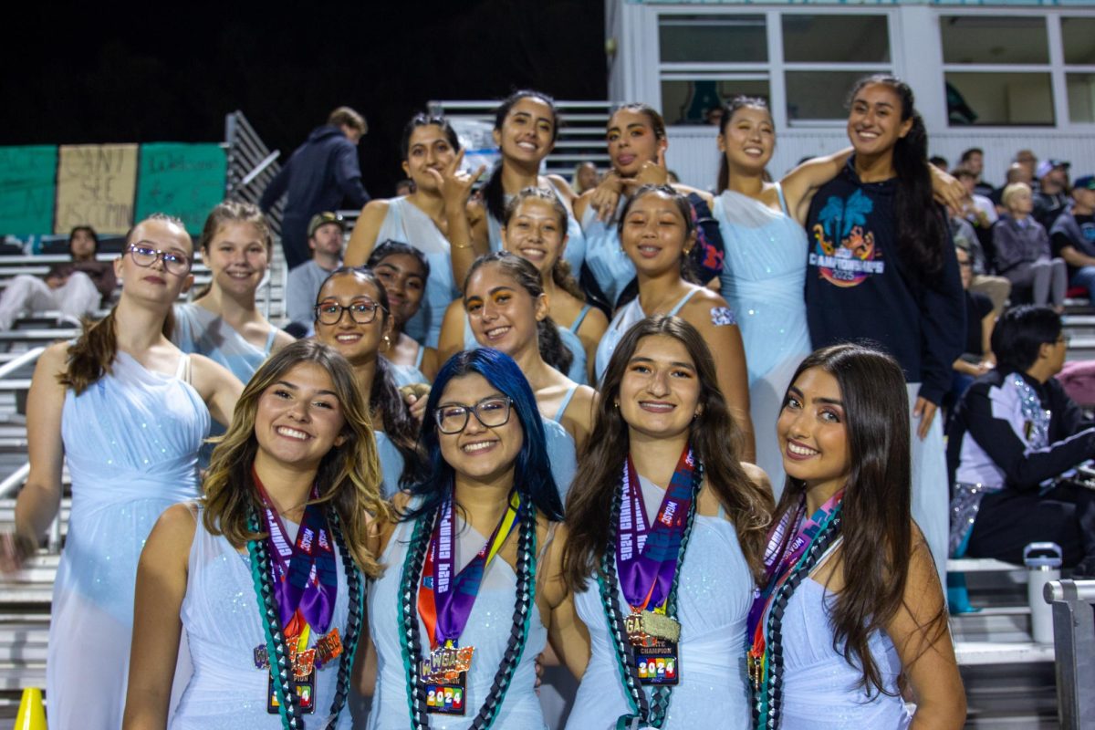 Color guard team posing for a photo