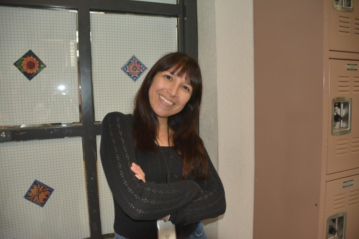 Ms. Aguirre smiles for a picture
